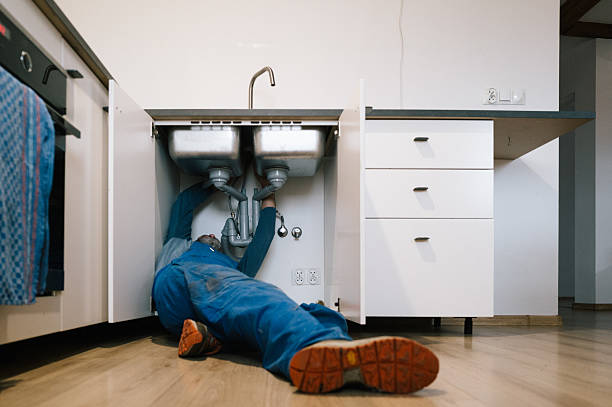 Professional Drain Cleaning technician working in Macks Inn, ID